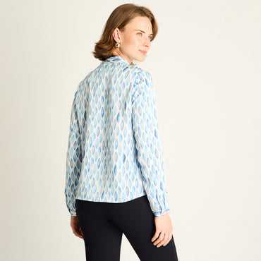 Blusa Celeste con Estampado Geométrico
