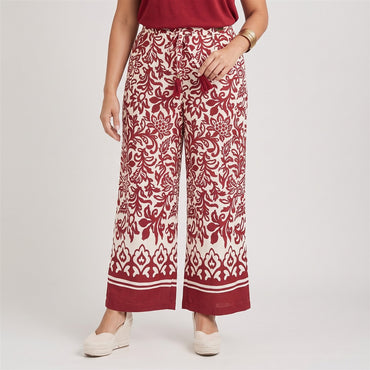 Pantalón Sport Culotte Estampado con Amarra en Cintura Beige en modelo plus size