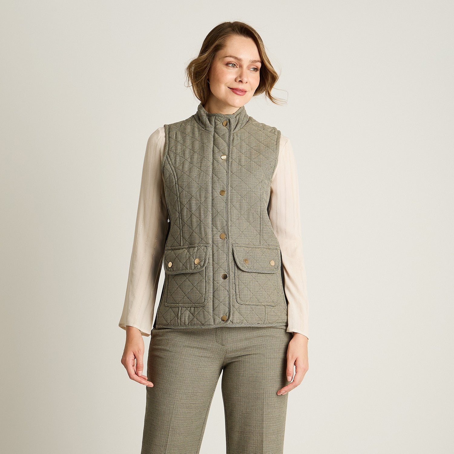 Parka Gris Sin Mangas con Bolsillos