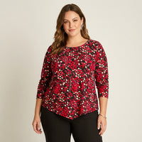 Polera Roja Manga Larga Estampada con Cuello Redondo y Collar