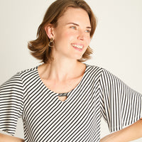 Polera Crudo a Rayas Diagonales