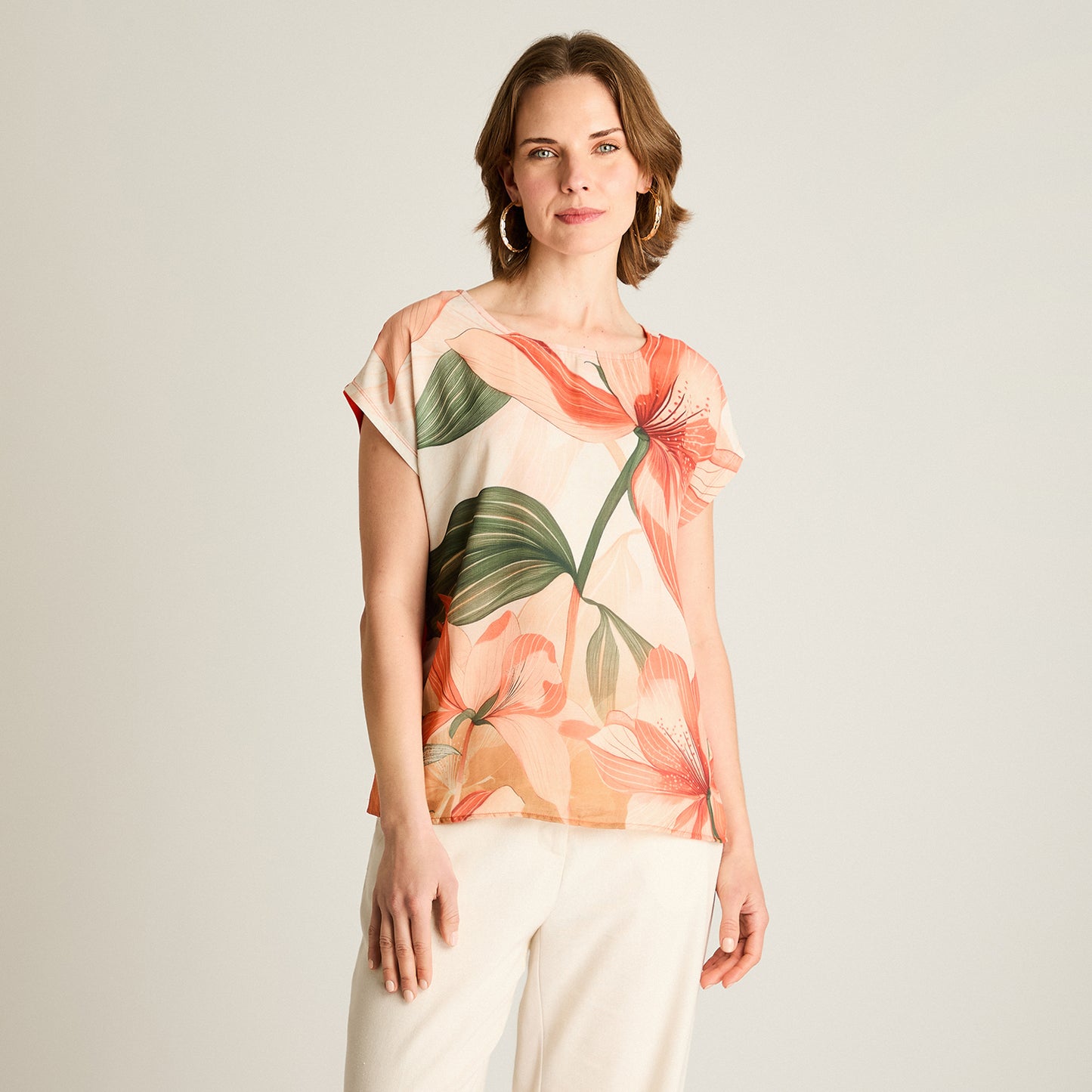 Polera Naranjo Floral Calce Holgado