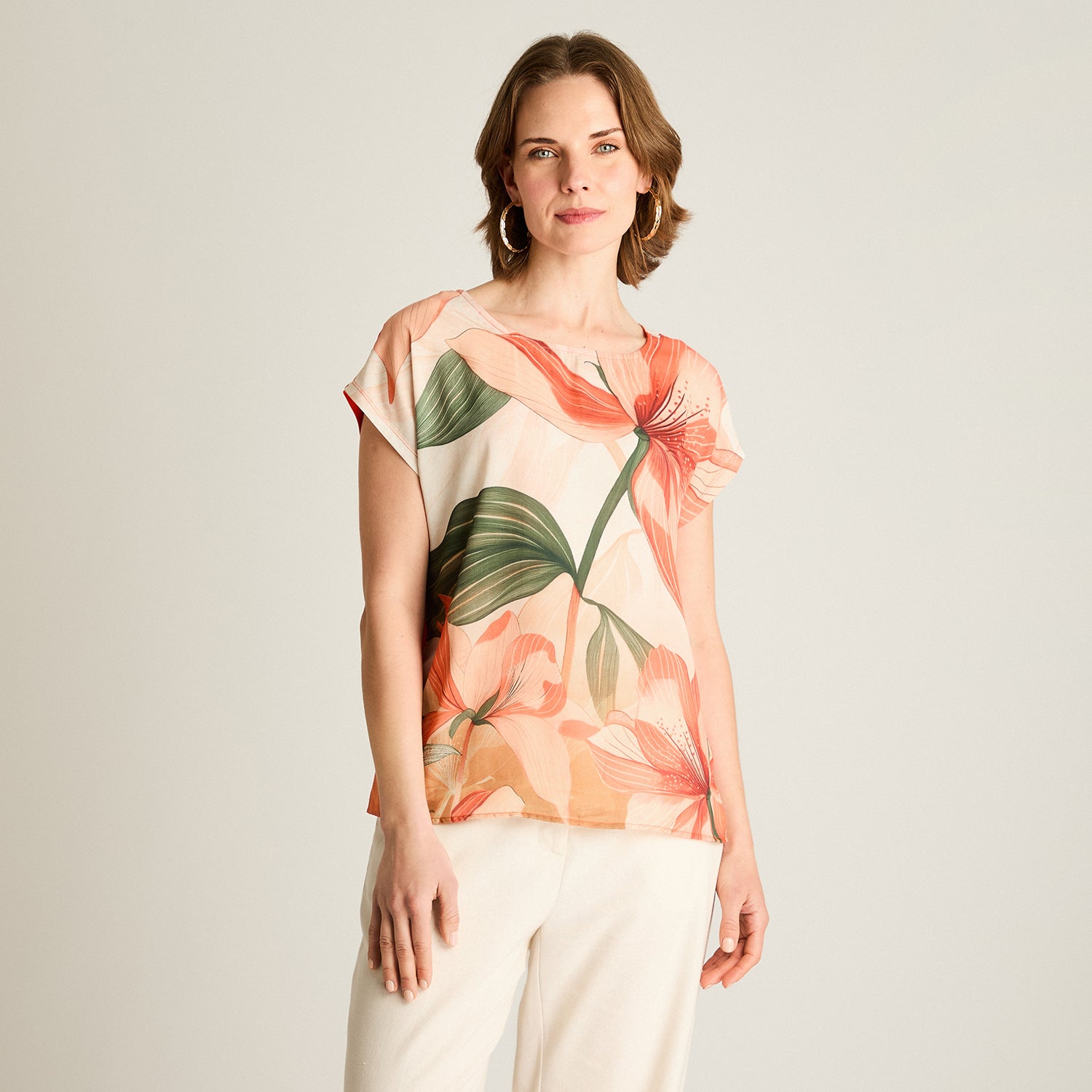 Polera Naranjo Floral Calce Holgado