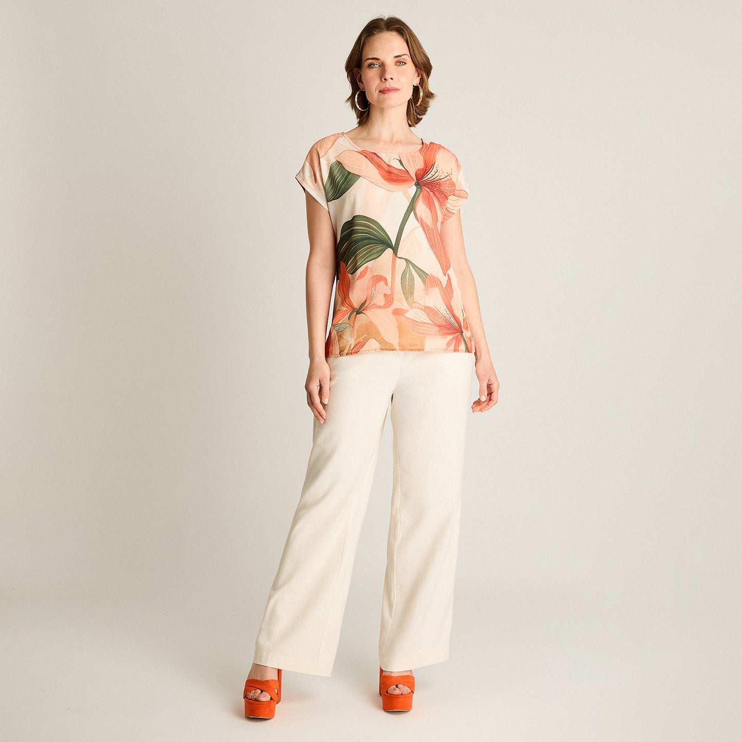 Polera Naranjo Floral Calce Holgado