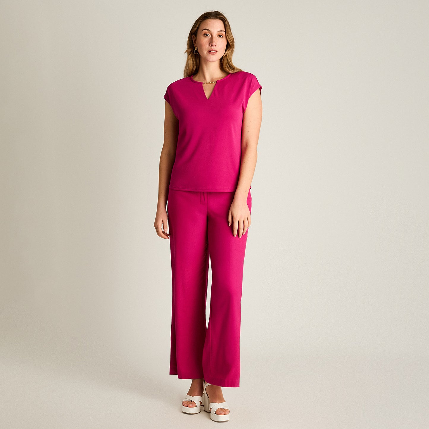 Polera Fucsia con Aplique Dorado