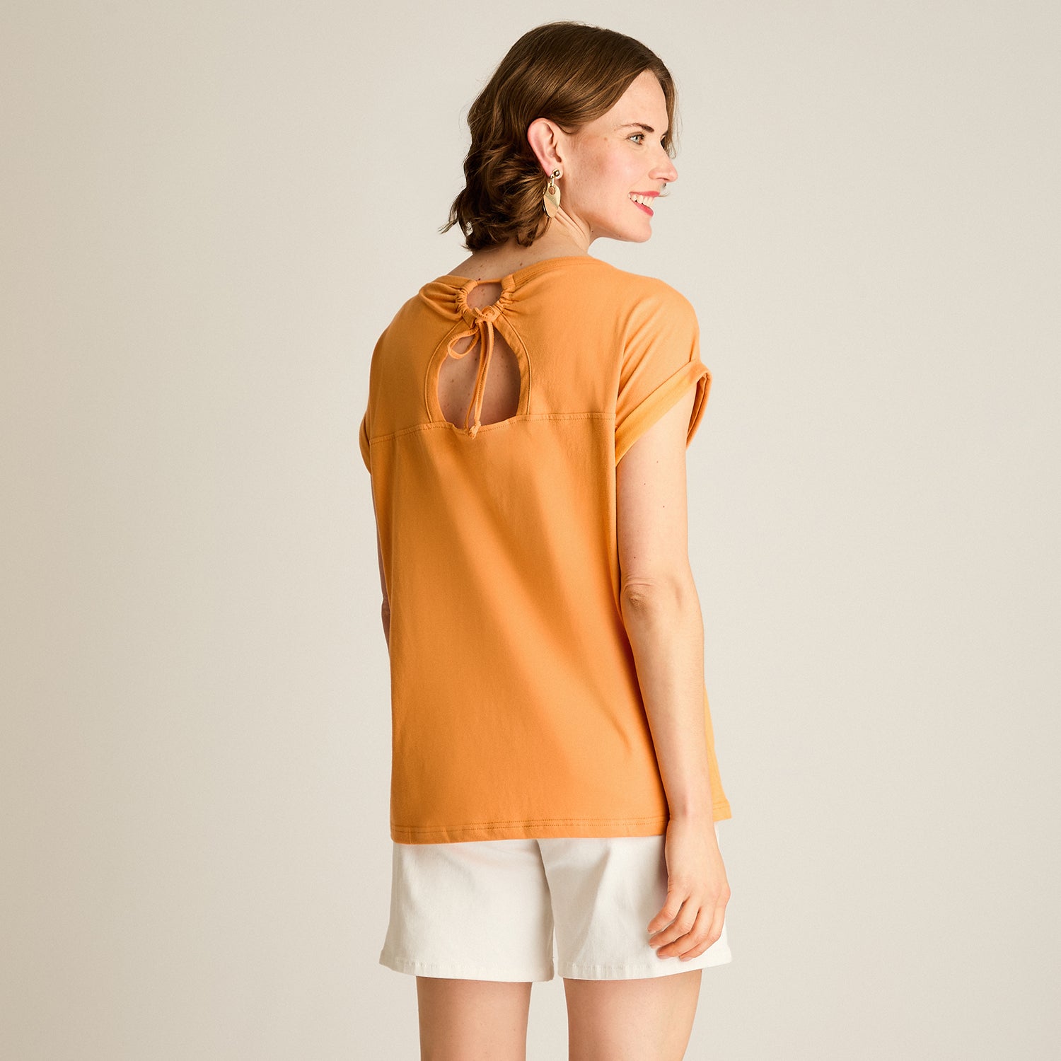 Polera Naranjo Manga Corta Elasticidad Media Sin Forro Calce Normal