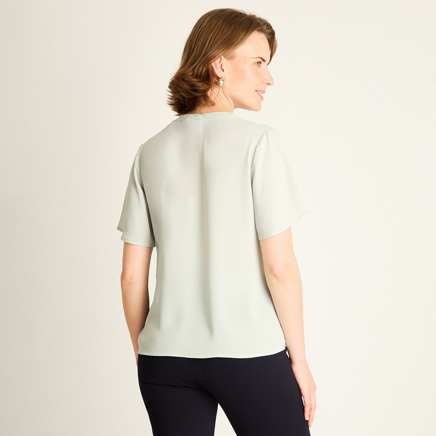 Blusa Menta con Bolsillos Frontales