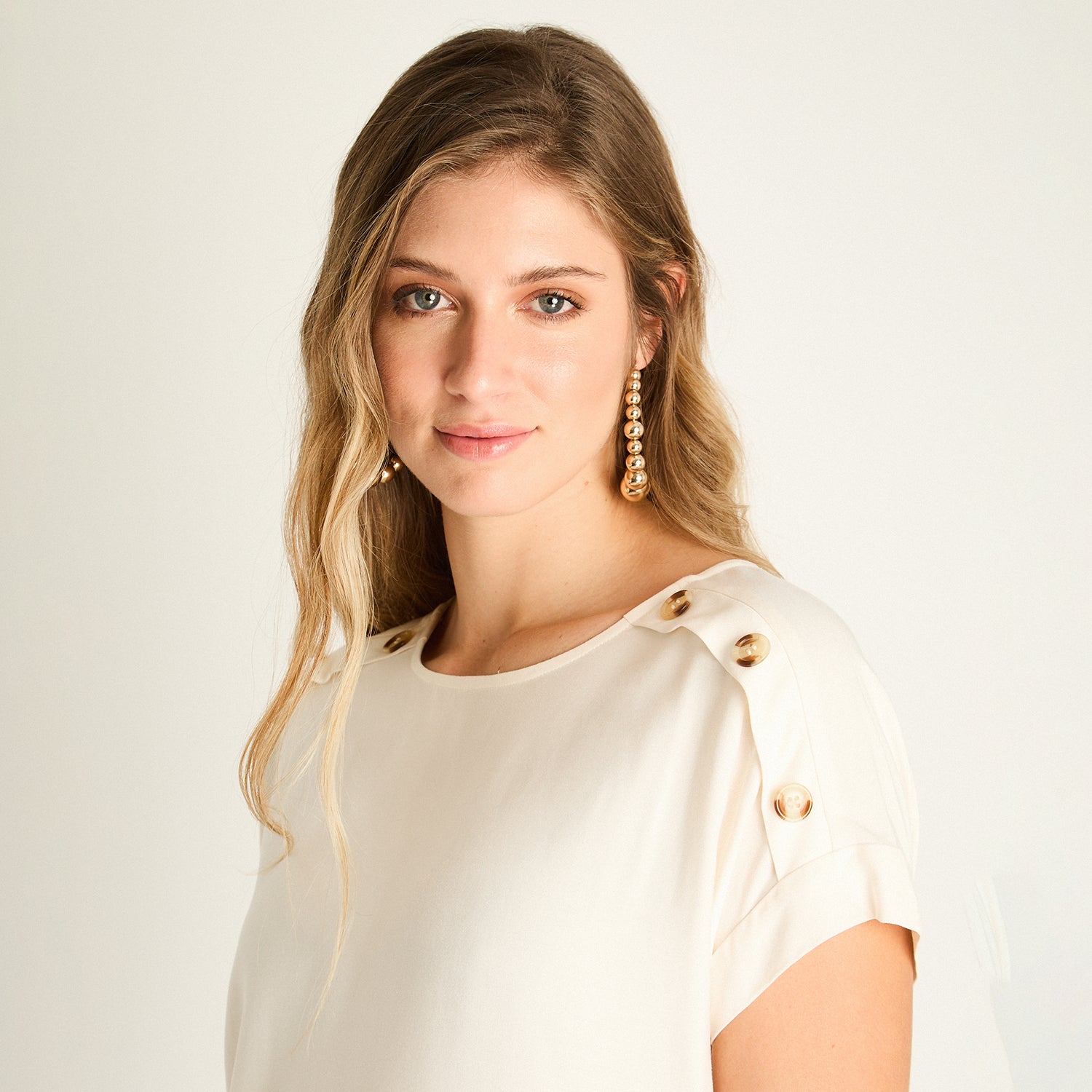 Blusa Arena con Botones Decorativos