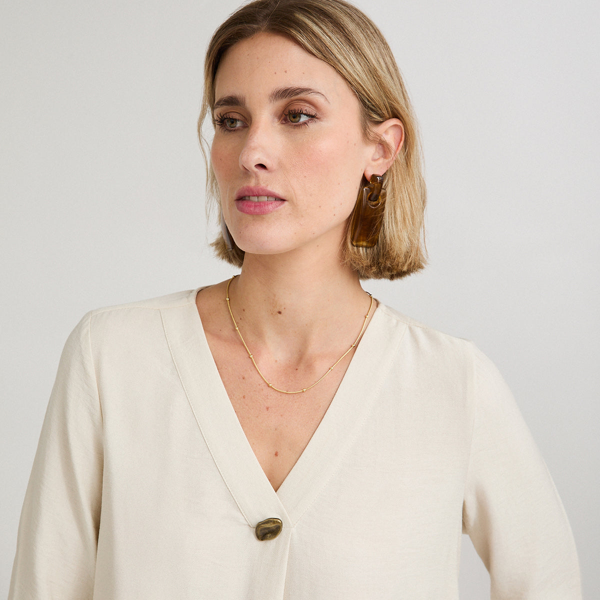 Blusa Manga 3/4 con Botón Crudo