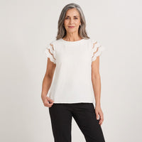 Blusa Manga Broderie Lisa Blanco en modelo adulta