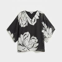 Túnica Negro Tela Fantasía en plano