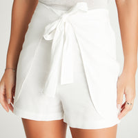 Falda Short Crudo Con Lazo