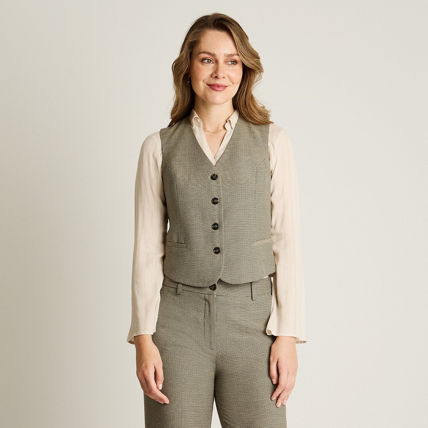 Gilette Gris Sin Mangas con Bolsillos Falsos