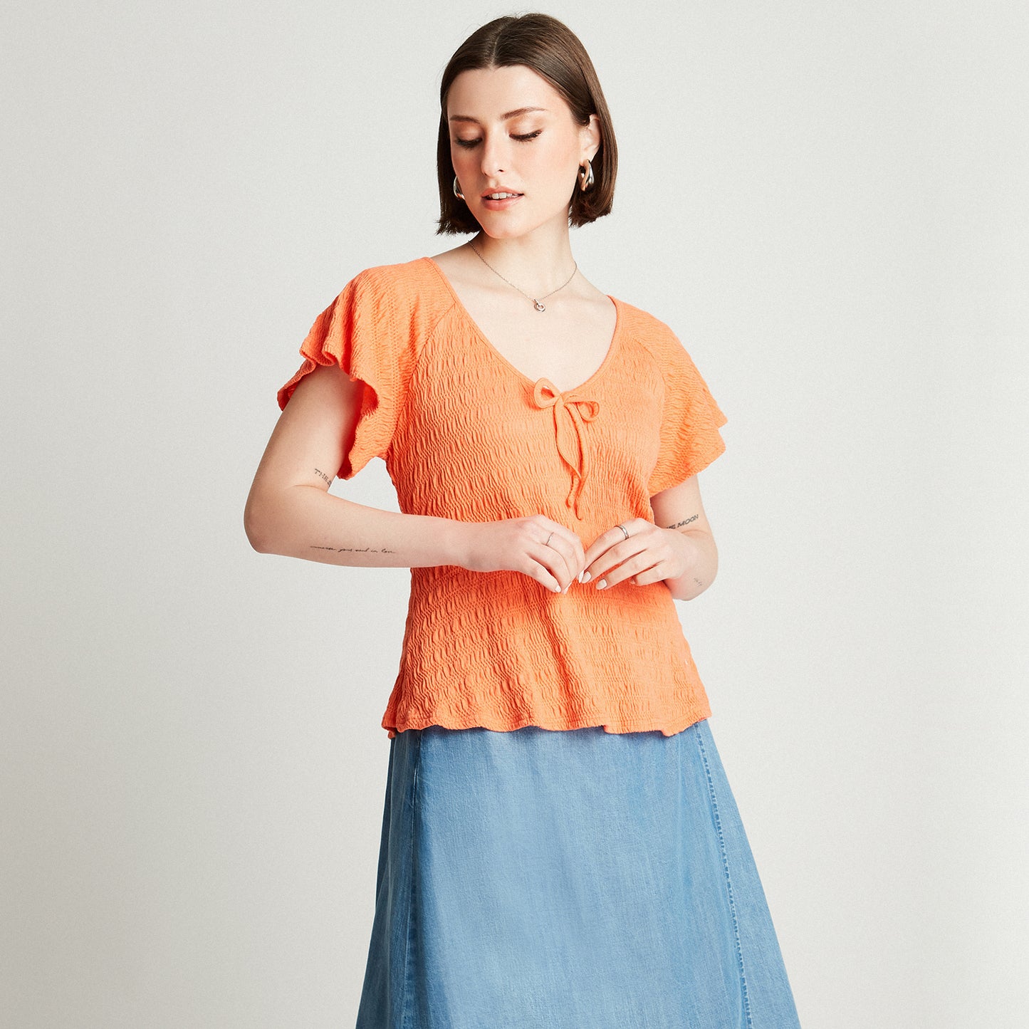 Polera Naranjo Manga Corta Cuello V